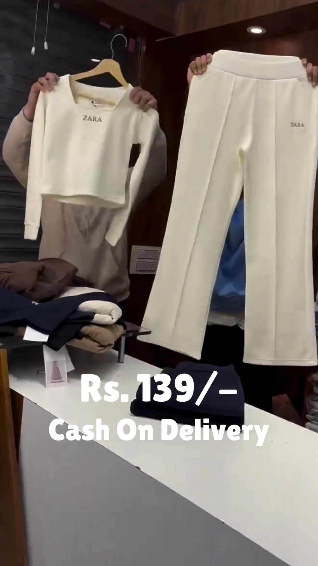 “Layered Ember II: Puffer Vest Over Hoodie with Monochrome Motion” 🧥🖤🤎