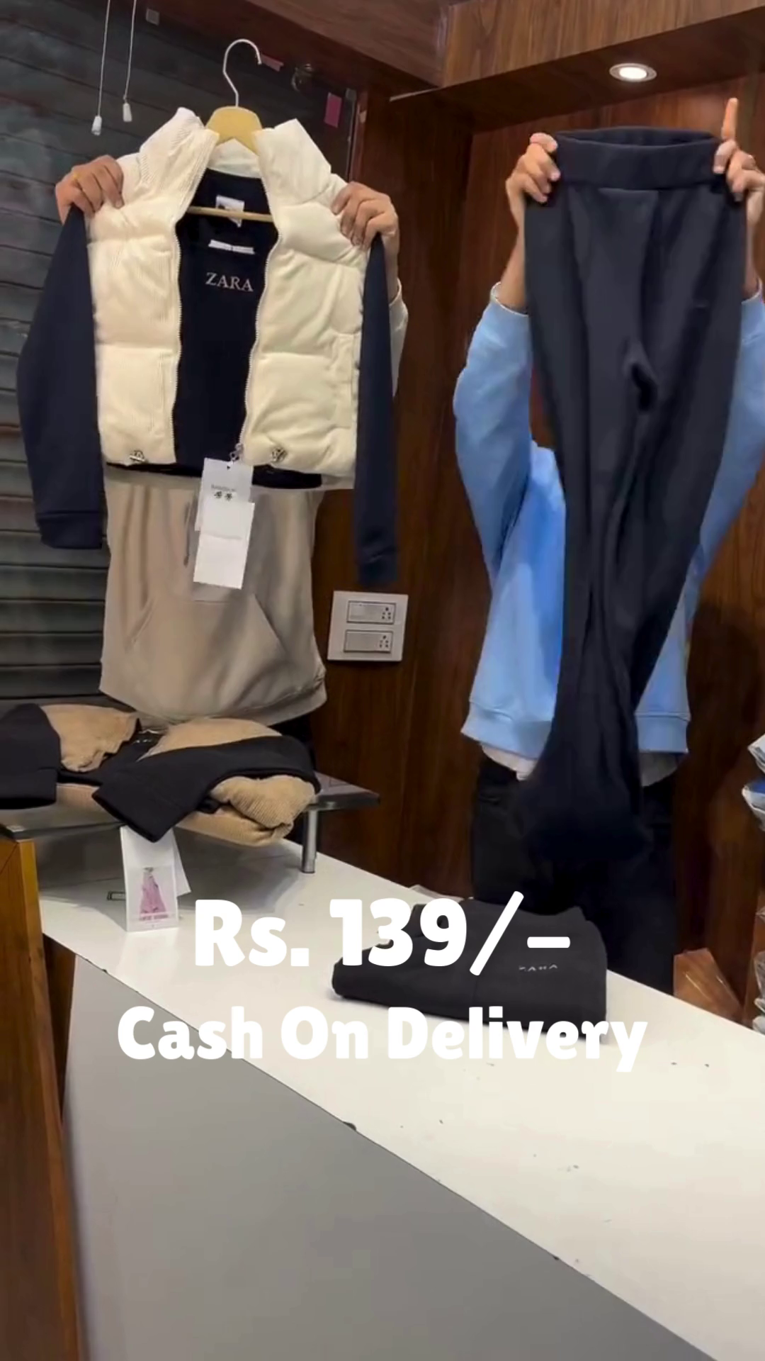 “Layered Ember II: Puffer Vest Over Hoodie with Monochrome Motion” 🧥🖤🤎