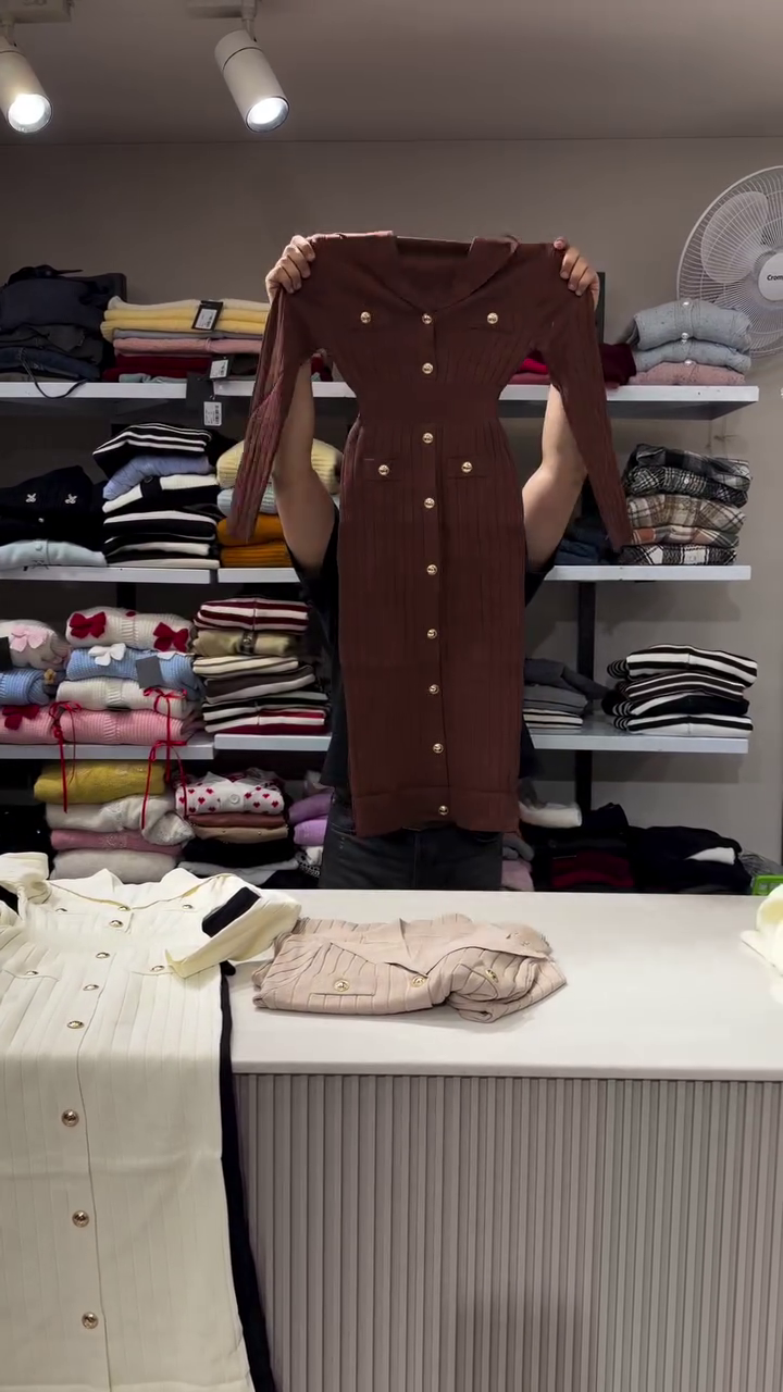 “Golden Hour Knit: Button-Down Dress of Radiance, Rhythm & Regal Comfort 🌞👗🌟”