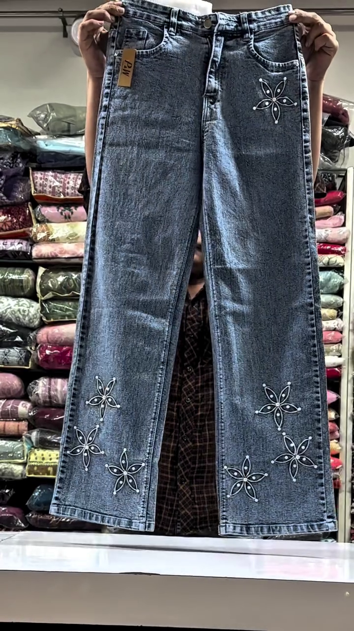“Petal Stitch: Embroidered Denim of Blossoms, Boldness & Everyday Bloom 🌼👖”