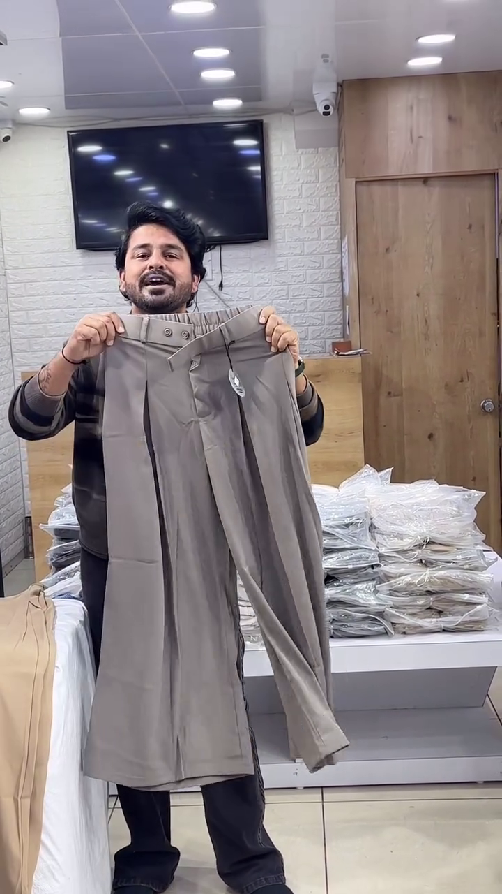 “Earthbound Elegance: Brown Pleated Trousers of Roots, Rhythm & Refined Ease 🌾👖✨”