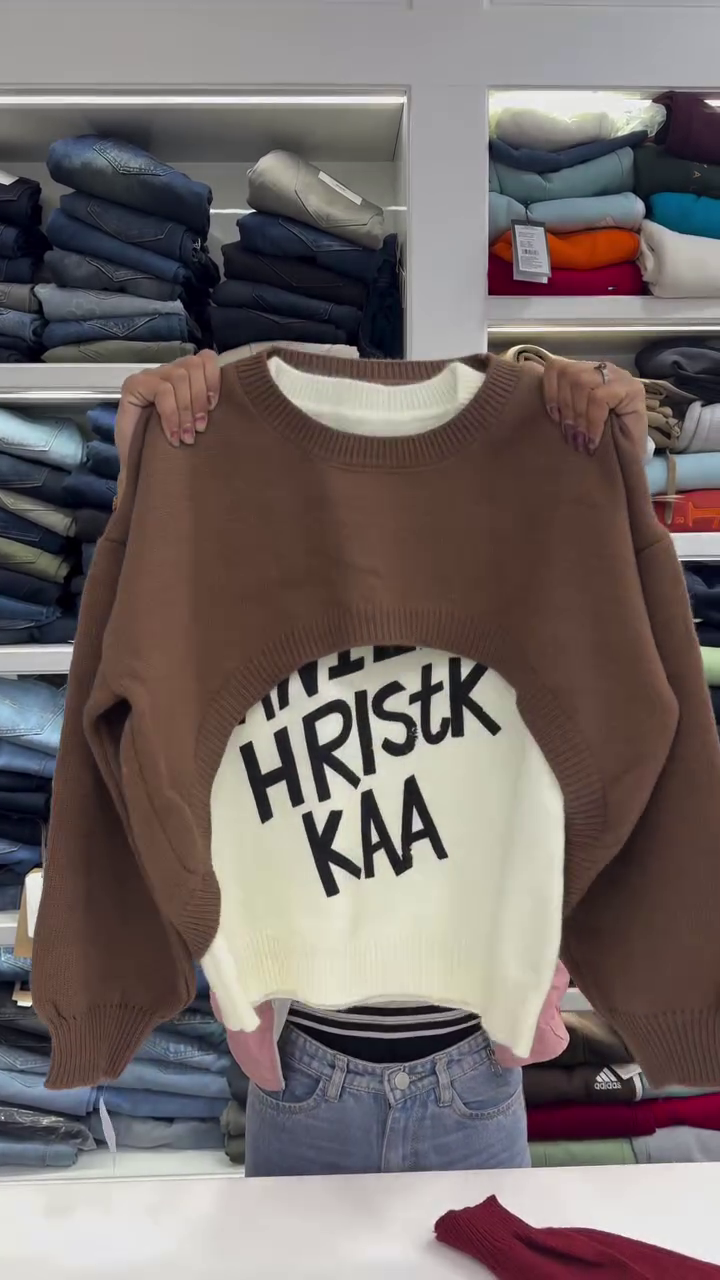 “Layered Echo: Cutout Sweater Duo of Contrast, Curiosity & Streetwise Charm 🧥🖤🧶”