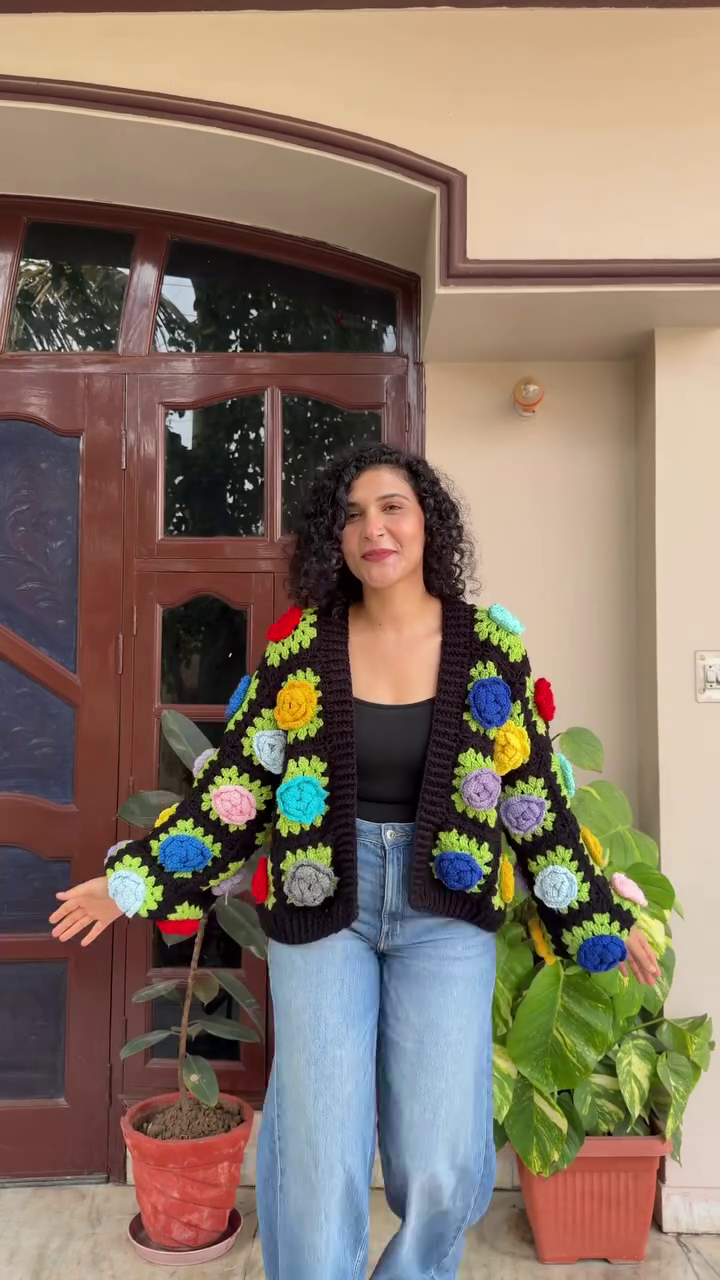 “Garden Glitch: Crocheted Cardigan of Wild Blooms & Handmade Joy 🌿💚🌸”