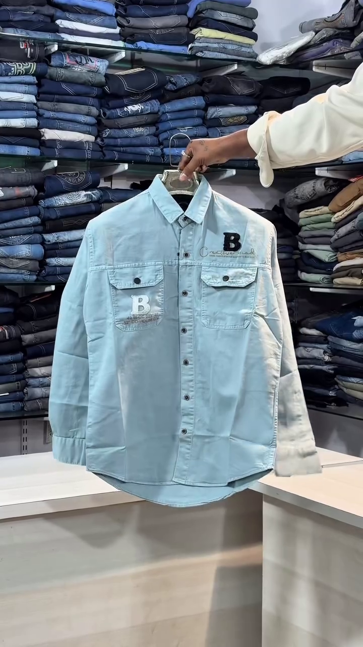 Light Blue Denim Shirt 💙👕 with Dual Chest Pockets 📦 White & Black Lettering 🅱️ Creative Print ✨ and Button-Down Closure ⚪139
