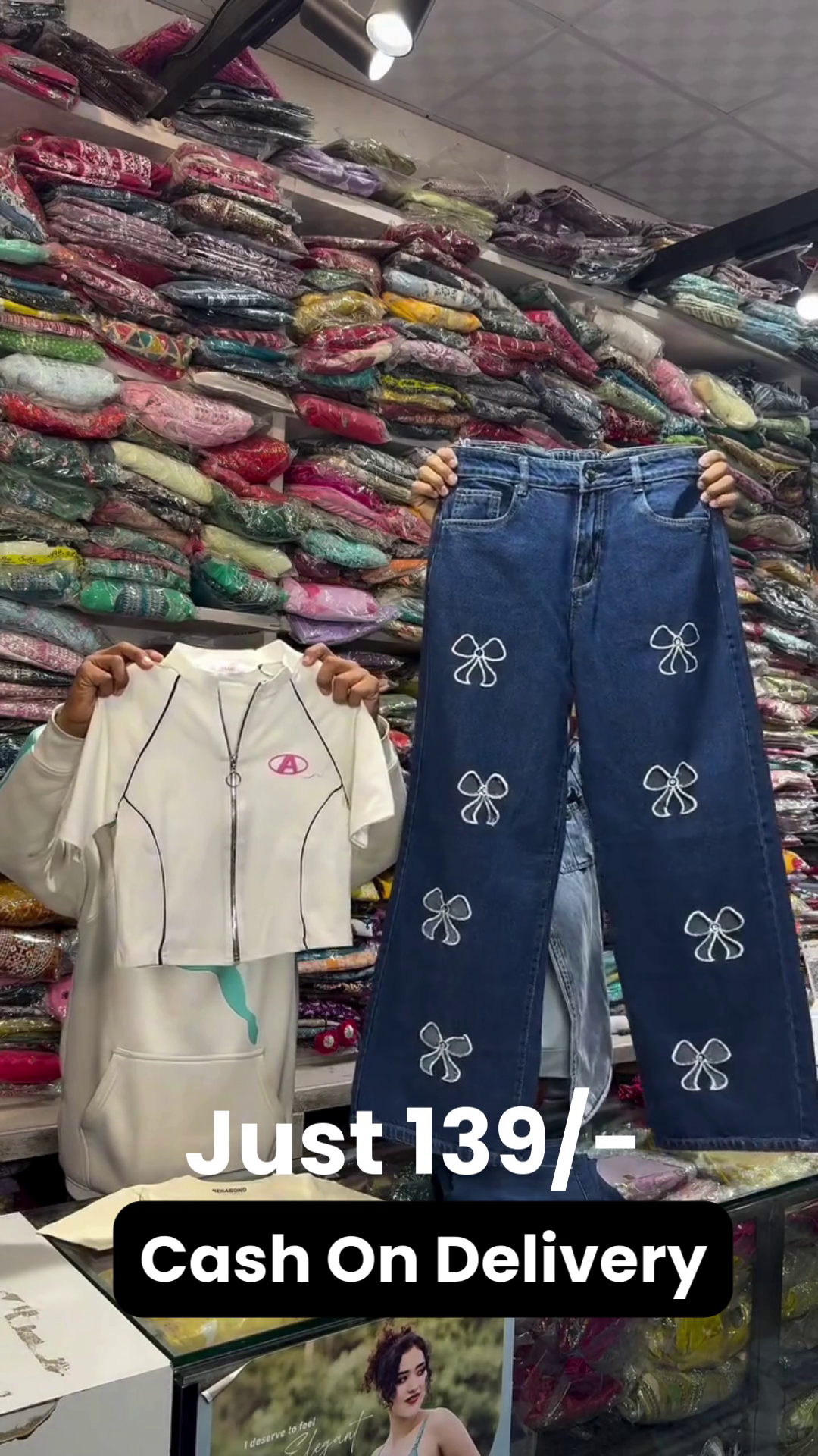 Brown Cropped Championship T-Shirt 🤎👕 with Decorative Print ✨ Paired with Light Blue Wide-Leg Jeans 💙👖 Featuring Tie Details 🎀