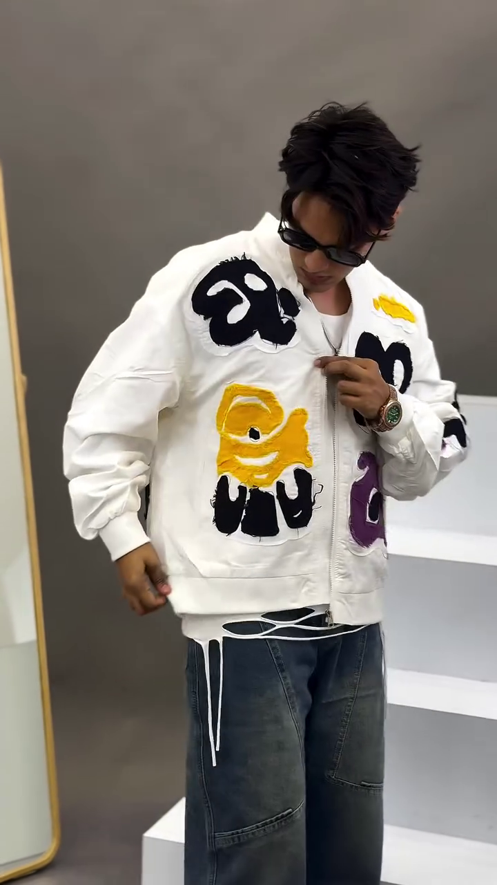 White Artistic Jacket 🤍🎨 with Abstract Colorful Patches 💛💜🖤 Zipper Front ✨ and Dark Denim Jeans 👖