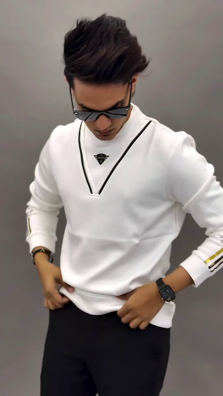 White Long-Sleeve Shirt 🤍👕 with Black & Gold Accents ✨ V-Shaped Neckline 🖤 Striped Cuffs 💛 and Black Pants 👖