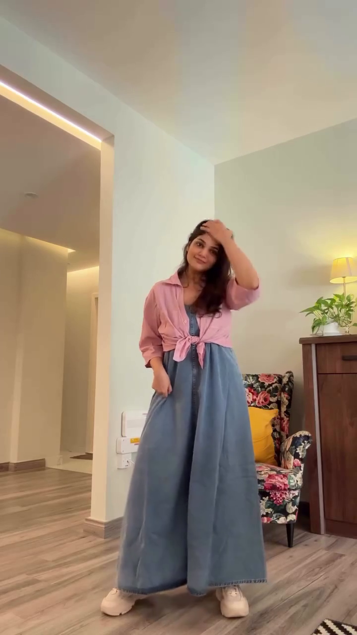 Blue Denim Long Dress 💙👗 Layered Over White Long-Sleeve Top 🤍👕 with Casual White Sneakers 👟 Cozy Modern Styling ✨