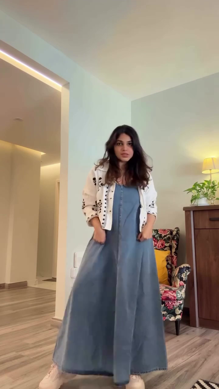 Blue Denim Long Dress 💙👗 Layered Over White Long-Sleeve Top 🤍👕 with Casual White Sneakers 👟 Cozy Modern Styling ✨