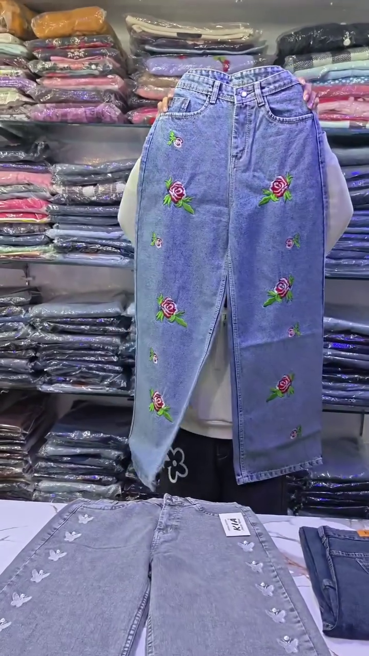 Light Blue Denim Jeans 💙👖 with Vertical White Butterfly Designs 🦋✨ Five-Pocket Style 📦 and Button Closure ⚪