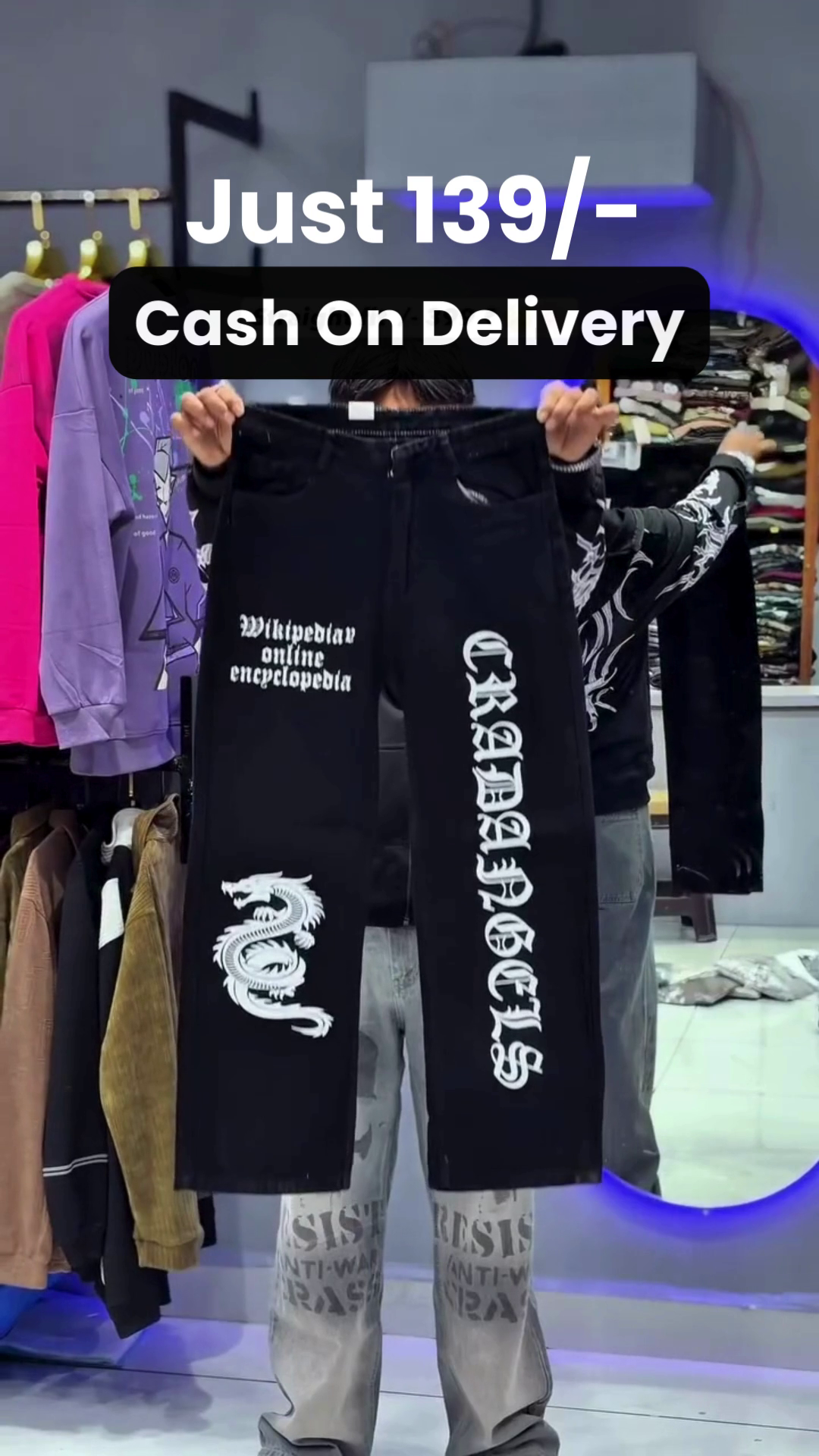 White Anime-Graphic Pants 🤍👖 with Colorful Japanese-Inspired Illustrations 🎨🗾 Stylized Eyes 👁️ Character Artwork 🧑‍🎨 and Bold Streetwear Appeal ✨