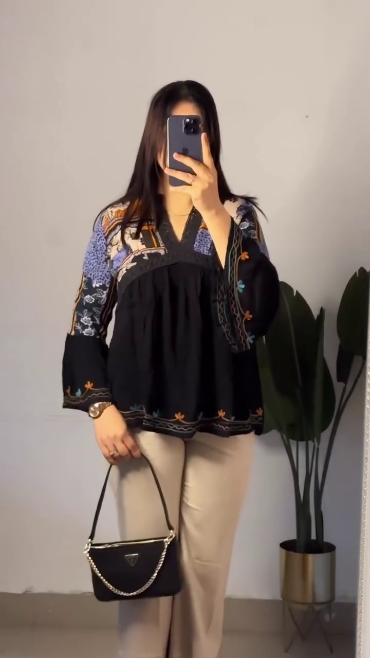 Elegant Bohemian Embroidered Black Flared Sleeve Tunic Top with Beige Tailored Wide-Leg Trousers, Structured Mini Shoulder Bag & Glossy Nude Pointed Heels Set