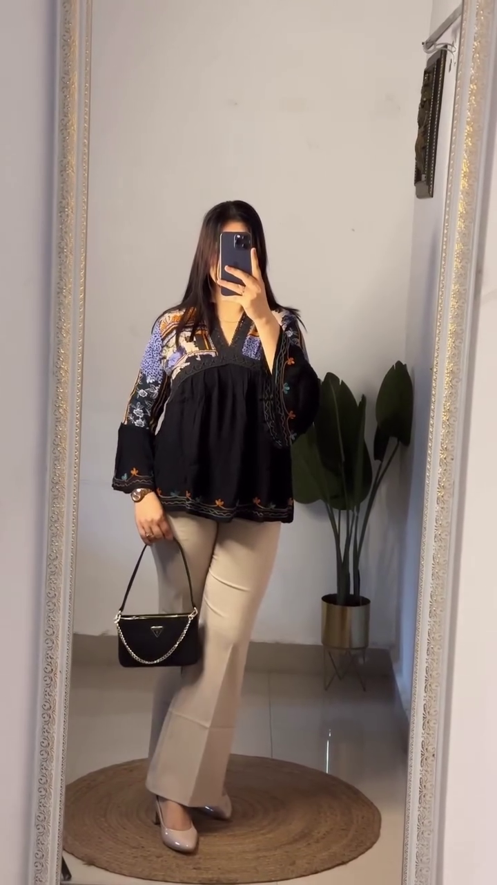 Elegant Bohemian Embroidered Black Flared Sleeve Tunic Top with Beige Tailored Wide-Leg Trousers, Structured Mini Shoulder Bag & Glossy Nude Pointed Heels Set