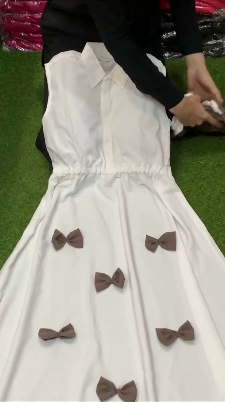 Brown Cropped Drawstring Blouson Top with Full-Length Sleeves Paired with Cream A-Line Flowy Skirt Featuring 3D Bow Appliqué Detail Co-Ord Set