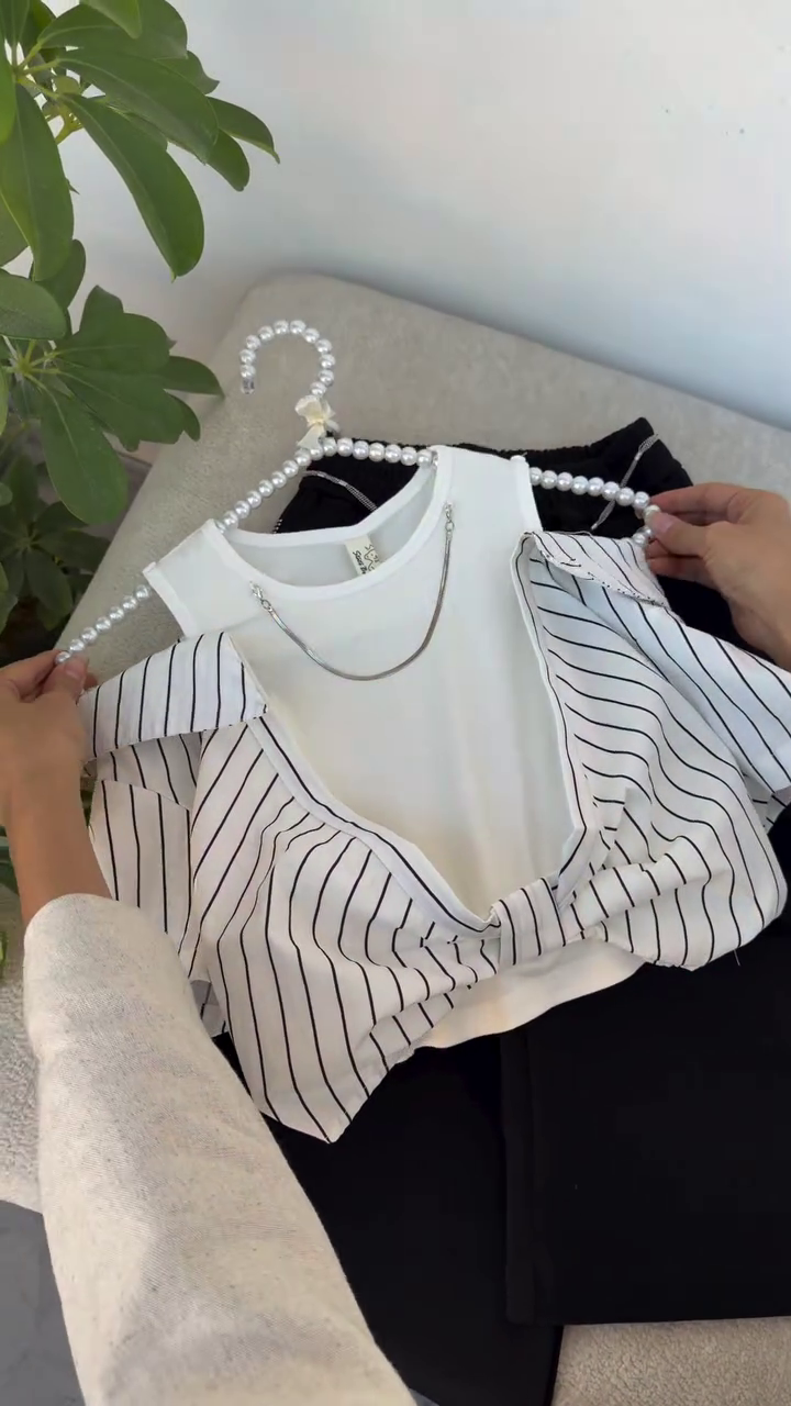 Layered White Sleeveless Inner Top with Black & White Pinstripe Overlap Blouse and High-Waist Black Bottom Set for Women 👚🖤