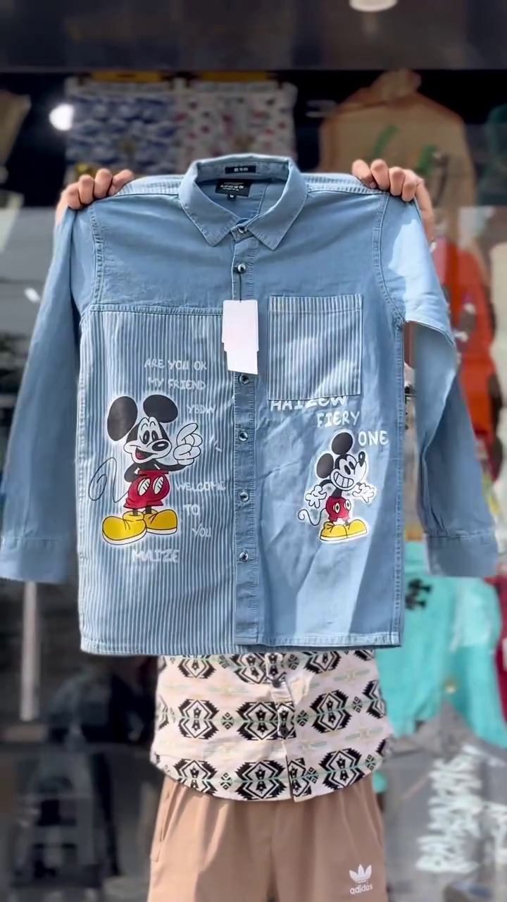 Dark Blue Half-Stripe Denim Button-Down Shirt with Cartoon Graphic Front Print and Vertical Panel Contrast Design