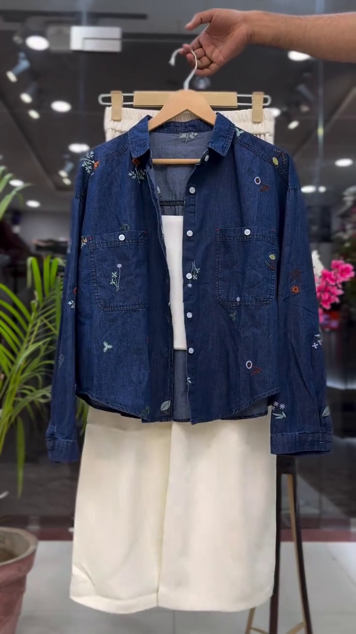 Dark Blue Embroidered Denim Button-Down Shirt with Dual Chest Pockets Paired with Soft Cream Wide-Leg Culotte Pants
