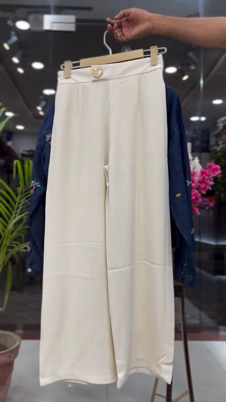 Dark Blue Embroidered Denim Button-Down Shirt with Dual Chest Pockets Paired with Soft Cream Wide-Leg Culotte Pants
