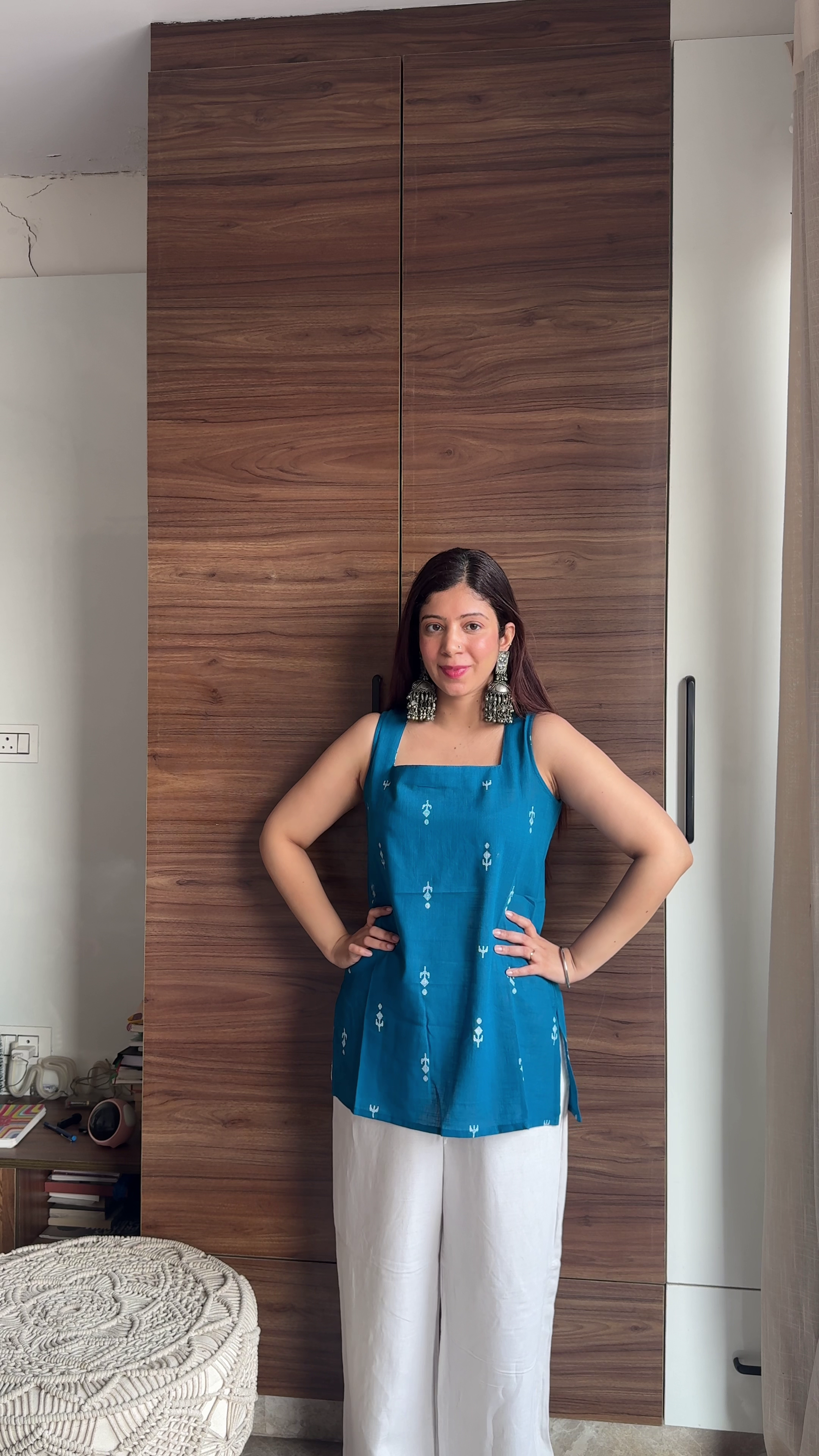 Teal Sleeveless Straight-Cut Ethnic Style Tunic Top with Minimal White Motif Print Paired with Off-White Wide-Leg Palazzo Pants