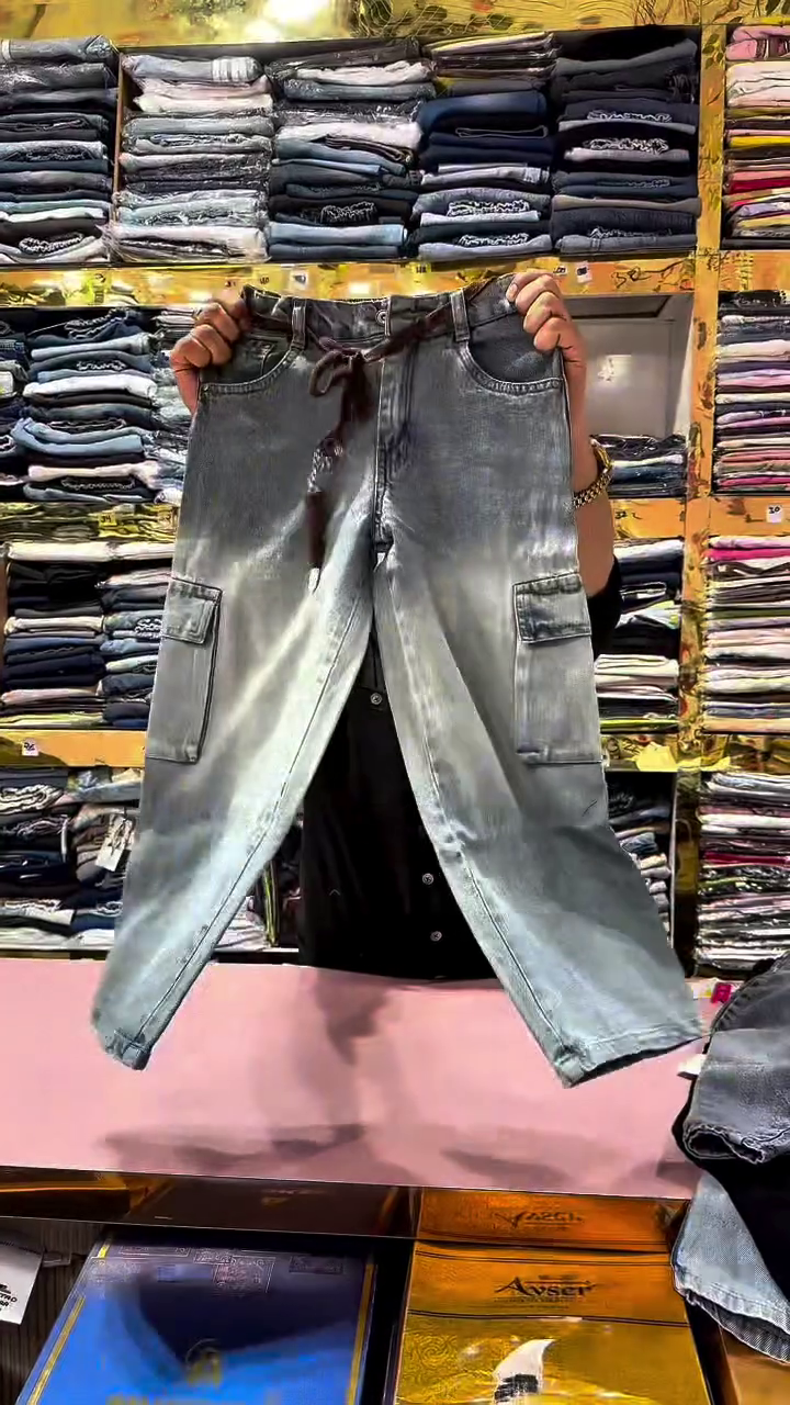 Light Acid-Wash Grey High-Rise Cargo Style Denim Jeans with Adjustable Drawstring Waist and Dual Side Utility Flap Pockets