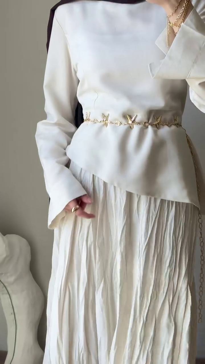 ✨ White Peplum Top + Pleated Maxi Skirt Set with Gold Chain Belt – Ethereal Elegance! ✨